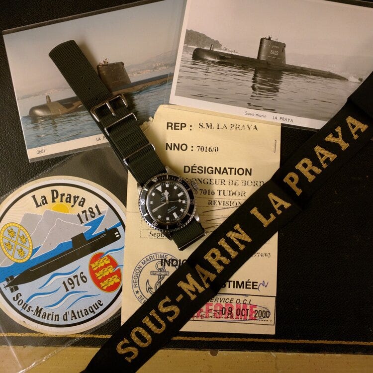 © WATCHISTRY | A Tudor Submariner ref. 7016 on top of its decommission papers. This particular example was issued to the attack submarine  La Praya , a fast-attack sub built by France in the 1970s.