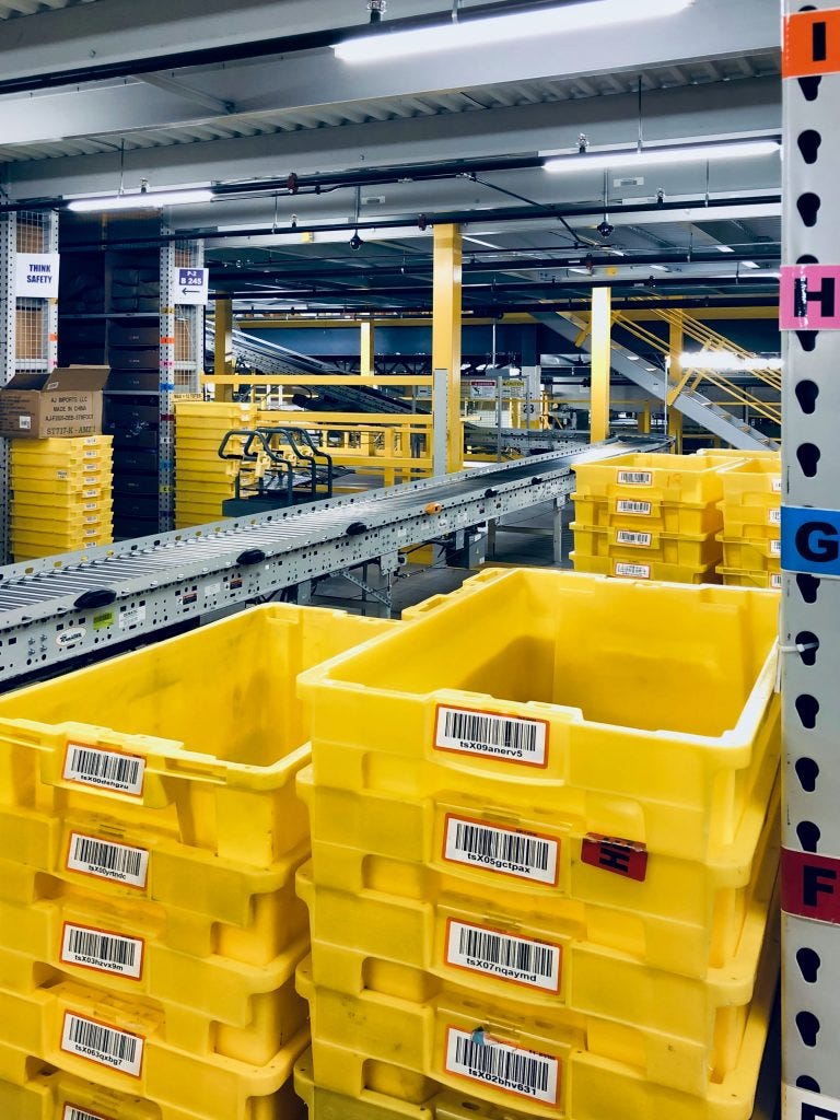 amazon yellow totes and conveyors