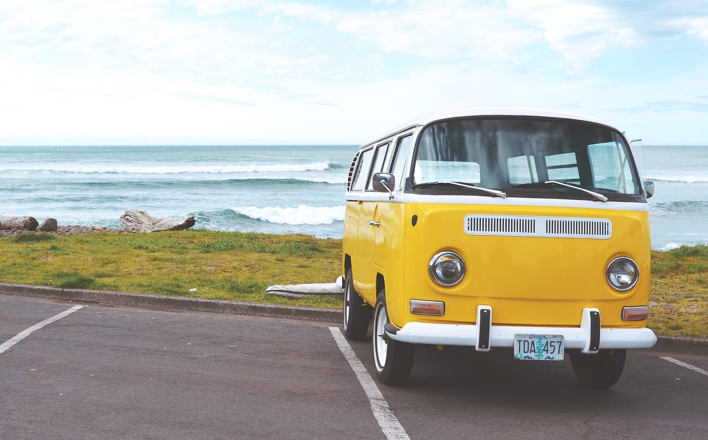 Yellow Volkswagen T2 van on road