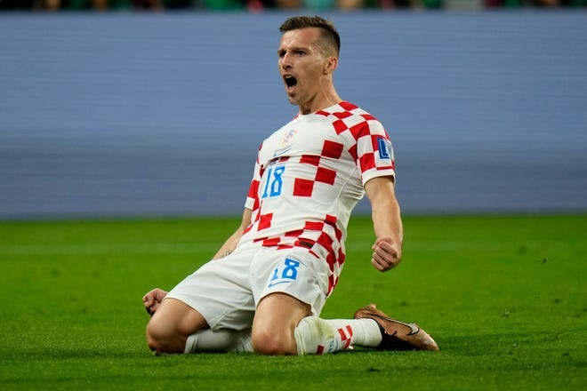 Croatia's Mislav Orsic celebrates after scoring his side's second goal during the World Cup third-place match against Morocco.