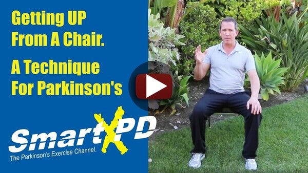 How to get out of a chair if you have Parkinson's- He makes it look easy!