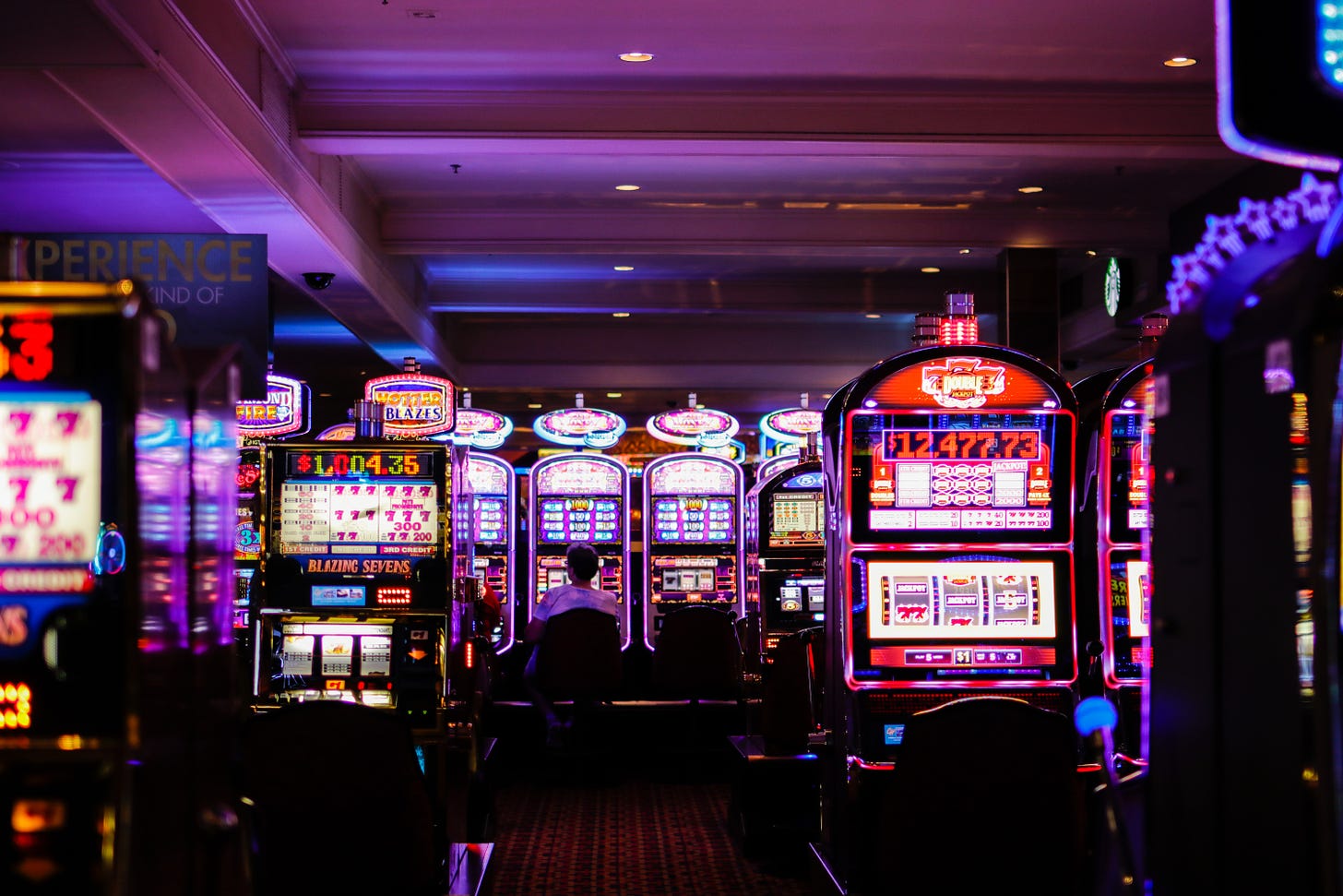 A photo of slot machines at a casino