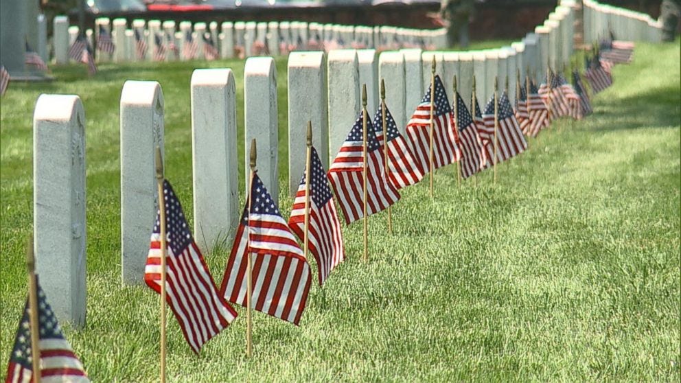 Honoring the Fallen: Soldiers Adorn Cemetery With American Flags in  Time-Honored Tradition - ABC News