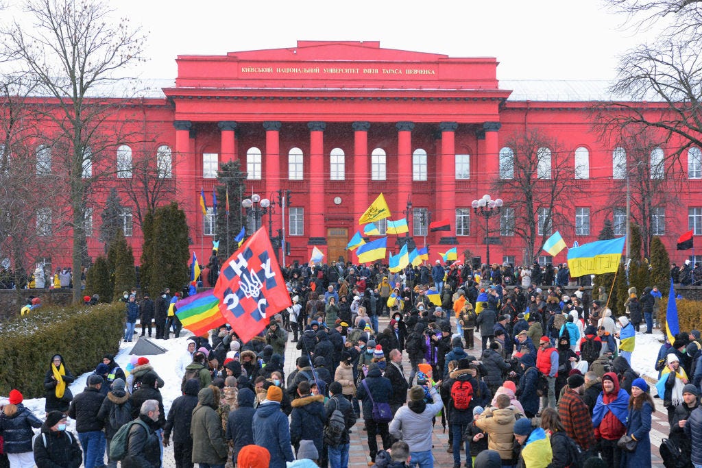 2022/02/12: Demonstrators hold flags and banners outside Kyiv National University during the Unity March.