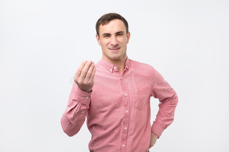Young Italian Man Doing a Typical Arguing Italian Gesture, Looking Straight  Ahead Stock Image - Image of calm, fists: 133811075