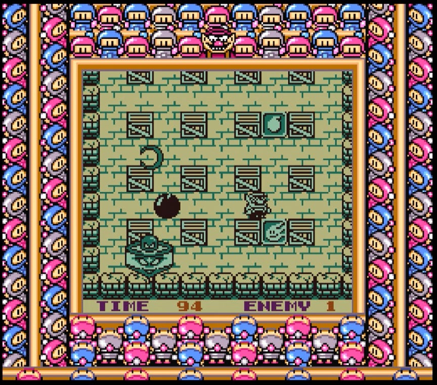 A screenshot showing Wario facing off against one of the game's bosses: multiple upgrades are on screen for dropping more bombs and more explosive ones.