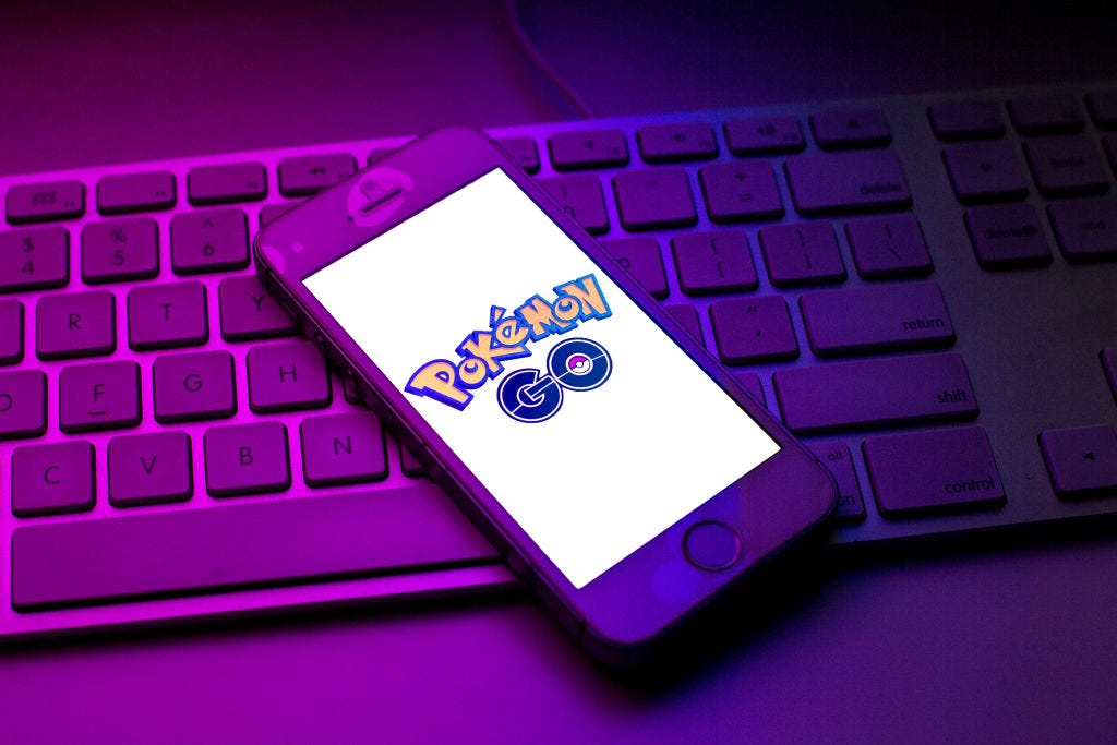 In this photo illustration a Pokemon GO logo seen displayed on a smartphone on top of a computer keyboard. (Thiago Prudêncio /  Getty Images)
