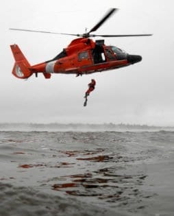 SAVANNAH, Ga. - Coast Guard Petty Officer 1st Class Tony Ariola, a helicopter rescue swimmer from Air Station Savannah, hones his skills in Charleston Harbor, S.C., during a training mission. The crew of the Coast Guard rescue helicopter was on their way to Air Station Savannah's northern staging area - Air Facility Charleston. Coast Guard photo by PA1 Donnie Brzuska, PADET Jacksonville, Fla.