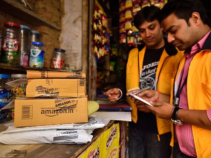 Why Amazon is considering buying a stake in India's Reliance ...