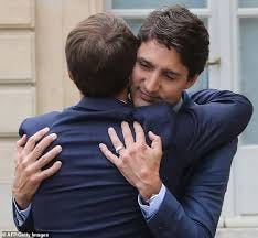 Emmanuel Macron embraces Canadian PM Justin Trudeau as he welcomes him to  the Elysee Palace | Daily Mail Online