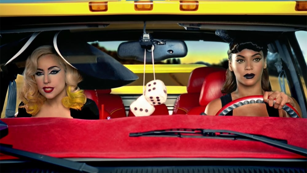 Beyoncé and Lady Gaga in a car. From the Telephone music video.
