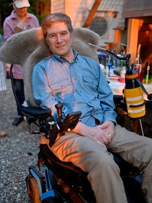 Bruce Rosenblum, an ALS patient and advocate, sits in his wheelchair.