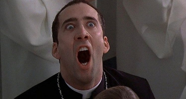 Nicholas Cage making a crazy face in the film Face/Off