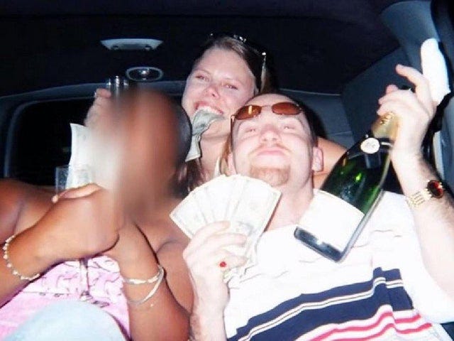 In 2005, Tiffany Cole, her boyfriend Michael Jackson and two other  accomplices kidnapped two elderly people from their home, robbed them and  buried them alive. This photo shows them celebrating after completing