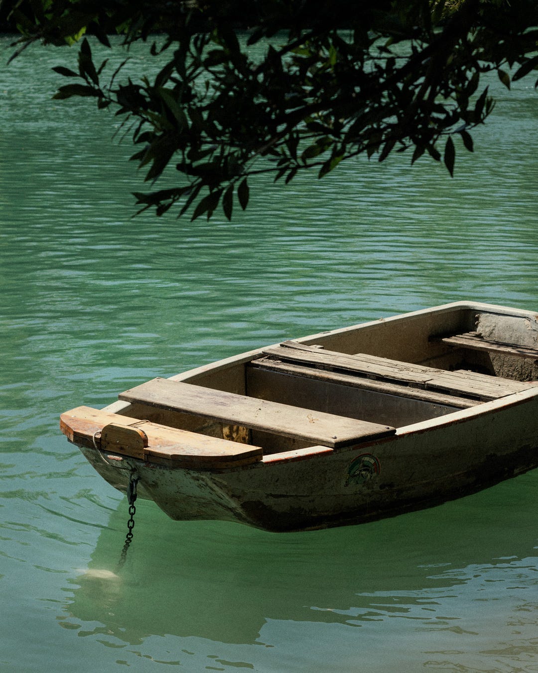 Close-up of wooden boat at the river