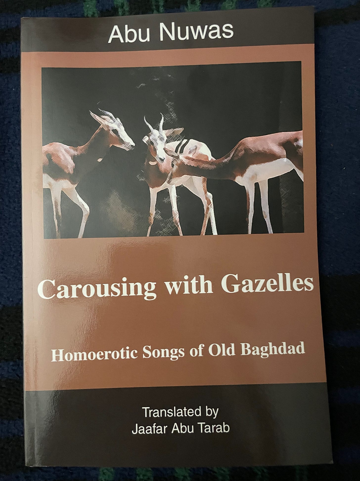 Photo of the cover of the book Carousing with Gazelles: Homoerotic Songs of Old Baghdad, by Abu Nuwas, translated by Jaafar Abu Tarab