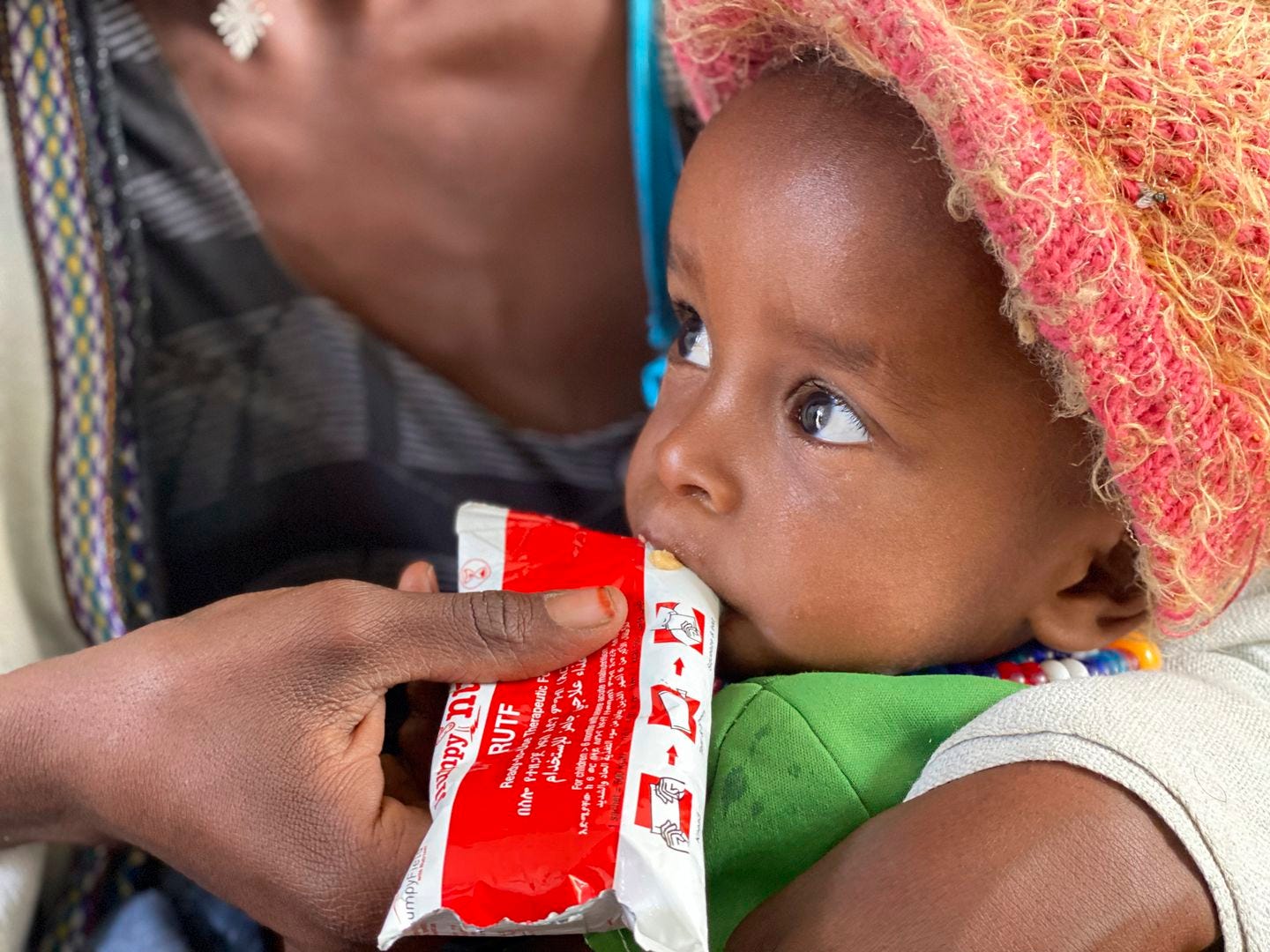 A child ate emergency food after being screened for malnutrition in Debub Health Centre in Southern Tigray in Ethiopia last week.