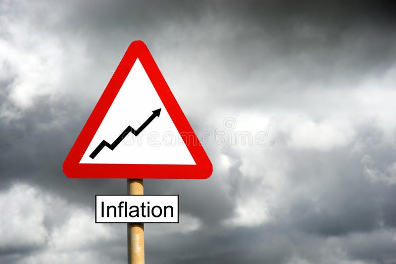 Inflation Warning. Sign against a stormy sky stock images
