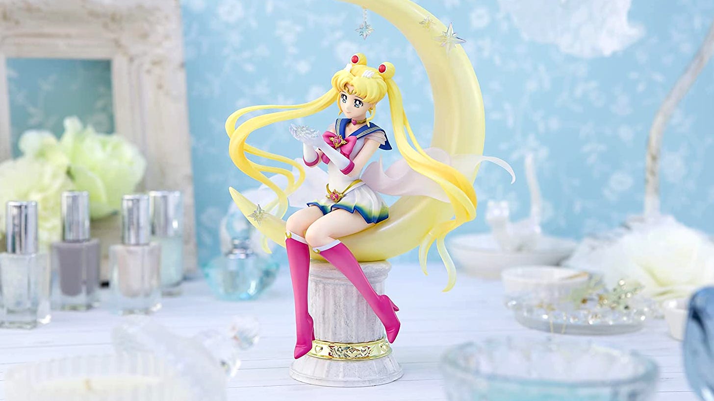 Figuarts Zero Chouette Super Sailor Moon model, Sailor Moon sitting on a crescent moon.