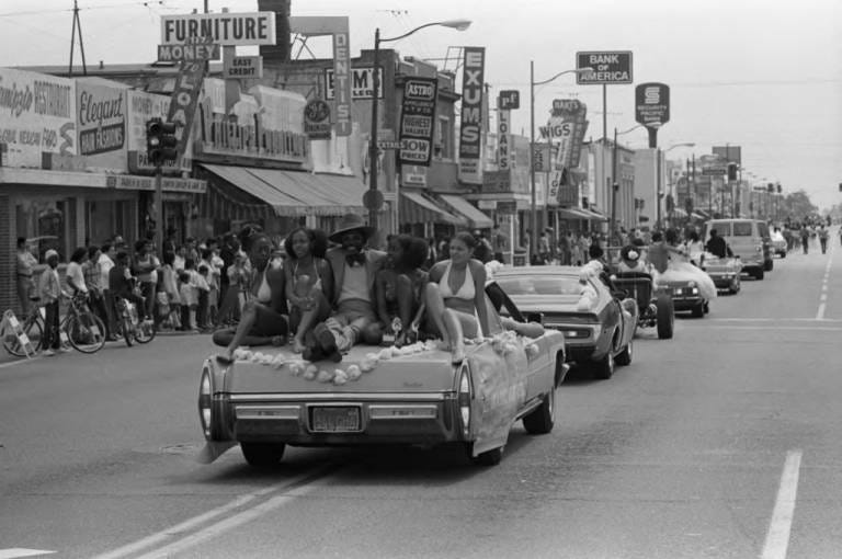 Cinco de Mayo Parade participants pass along a street in Compton, Los Angeles, 1973