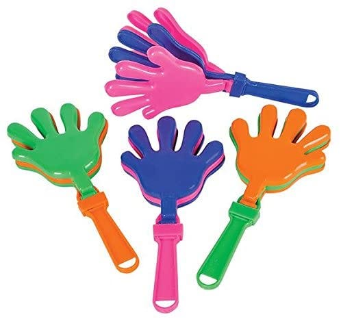 Four hand-clapper toys (three plastic hand cutouts attached to a hinge-handle, which, when you move them quickly, clap quickly). Two are green and orange, and two are blue and pink.