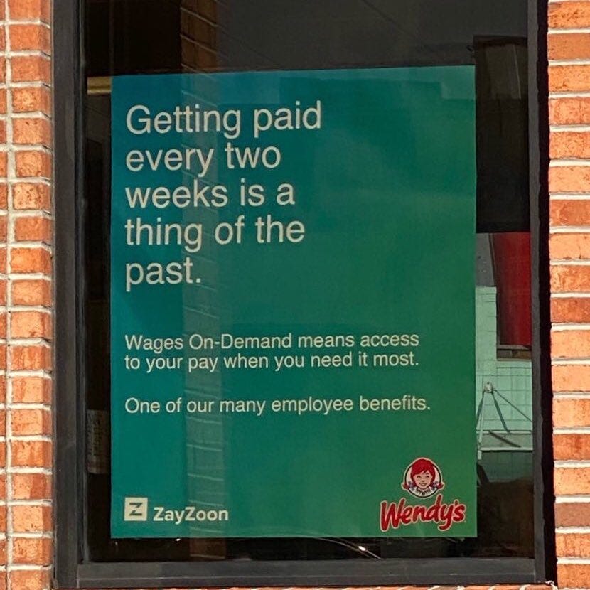 A Wendy’s franchise in Canada advertises earned wage access solutions to attract workers.
