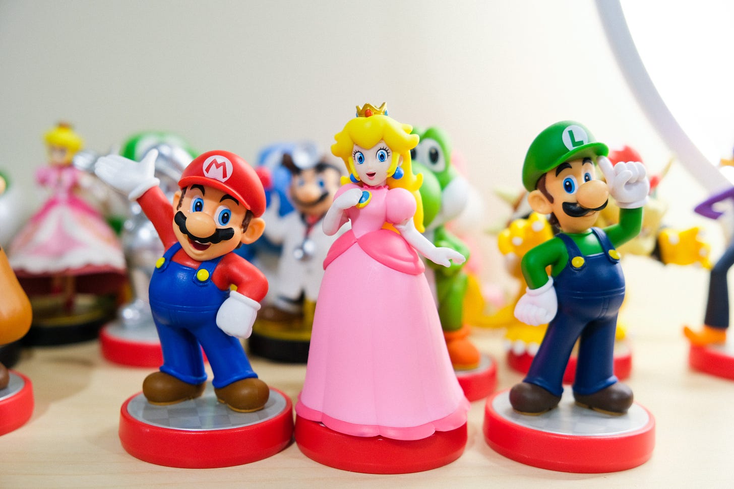 Mario, Luigi, and Princess Peach figurines photo