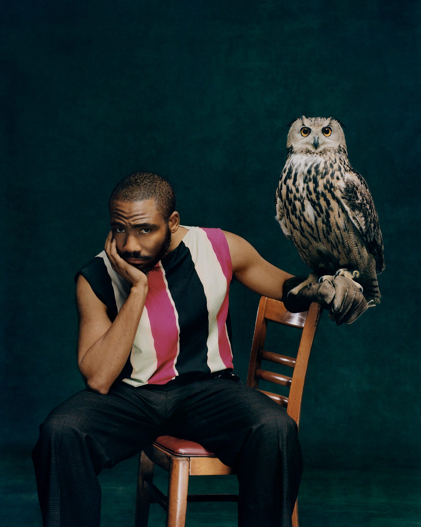 A picture of Donald Glover holding an owl. Why? No one has any idea, this is apparently just a thing photographers do. Like “we need some drama in this shoot. Someone get me an owl.” 