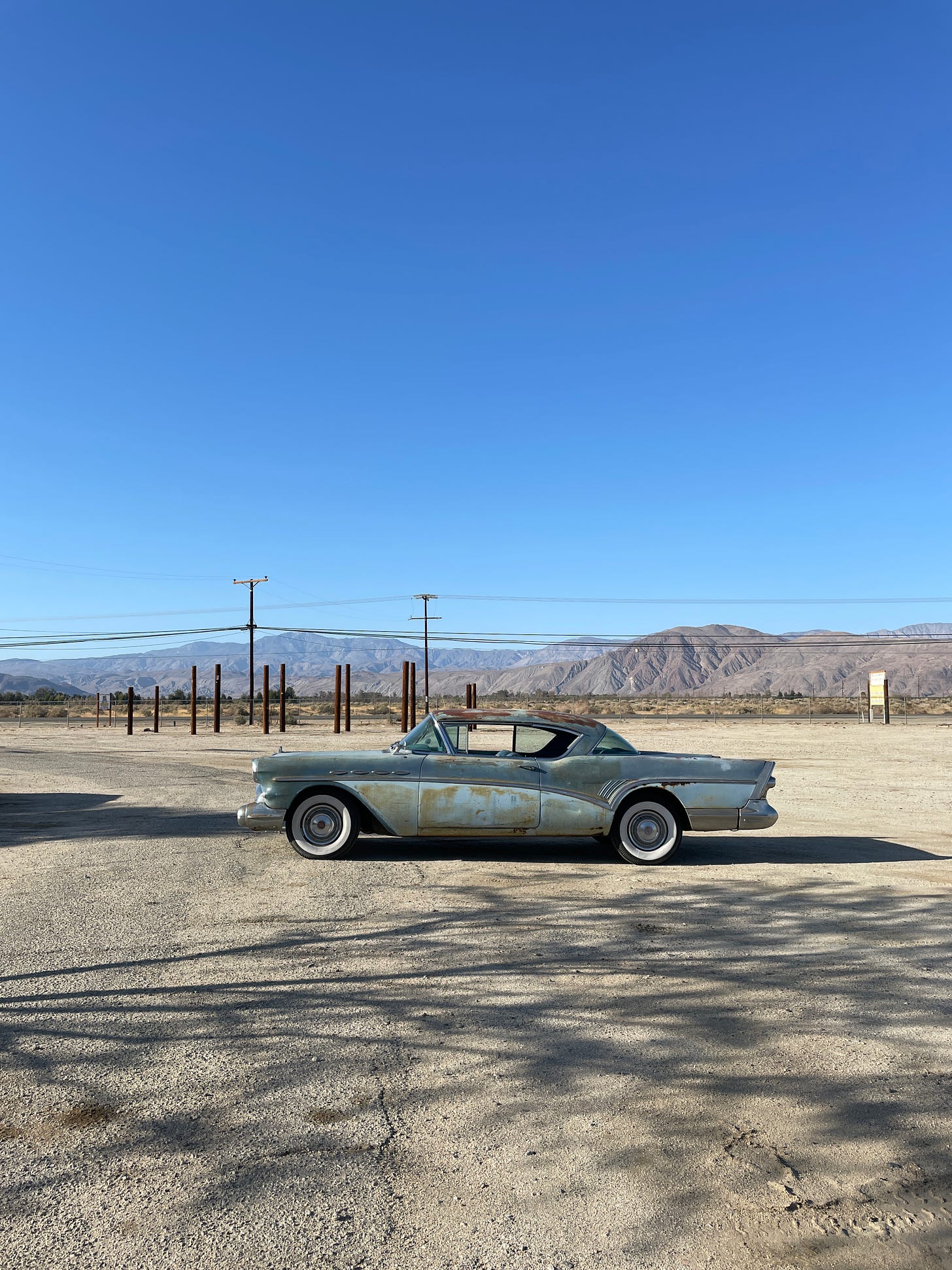 Rusted car in the desert