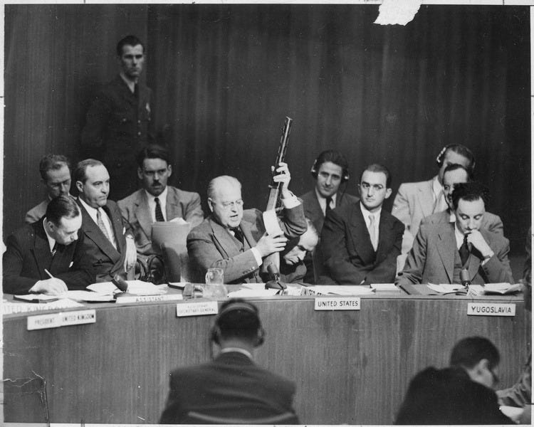 File:At United Nations Security Council, Warren Austin, U.S. delegate, holds Russian-made sub-machine gun dated 1950... - NARA - 541962.tif