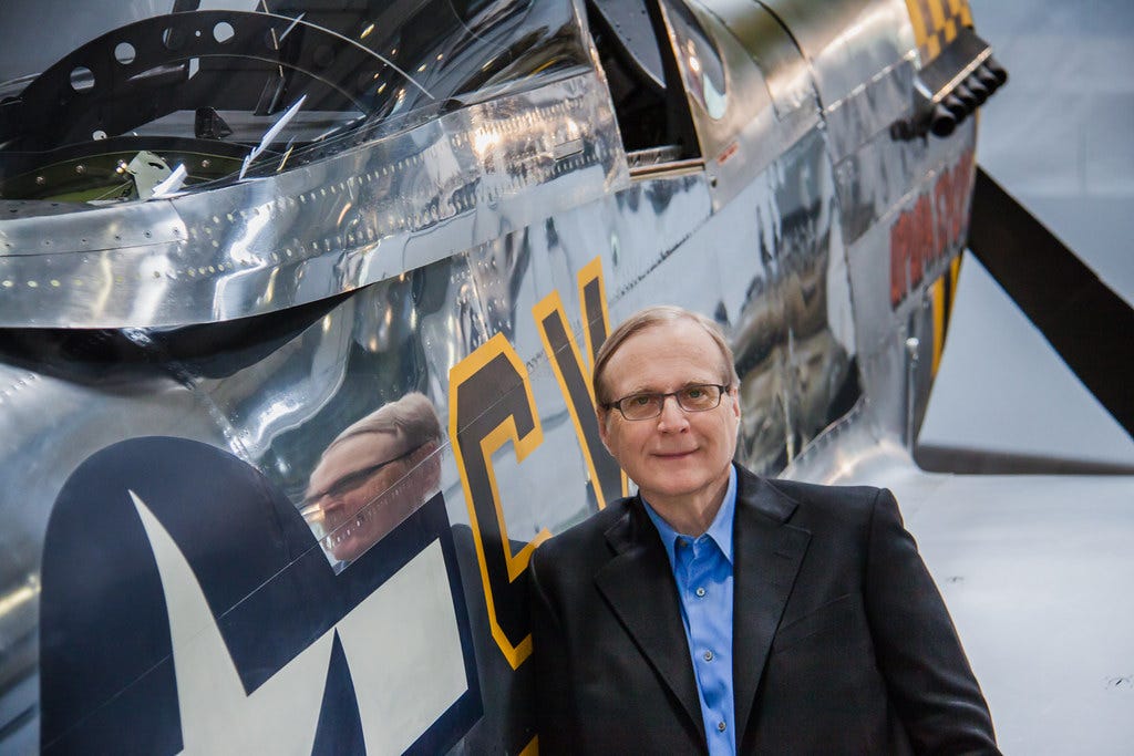 Paul Allen next to one of his favorite planes, the P-51 Mustang