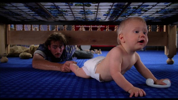 Nicolas Cage stars as H.I., an ex-con who finds himself in the midst of a baby-napping, in "Raising Arizona," a 1987 film directed by Joel Coen and produced by Ethan Coen.