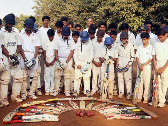 Kids in Mumbai, India pay tribute to the memory of Phillip Hughes. Source.