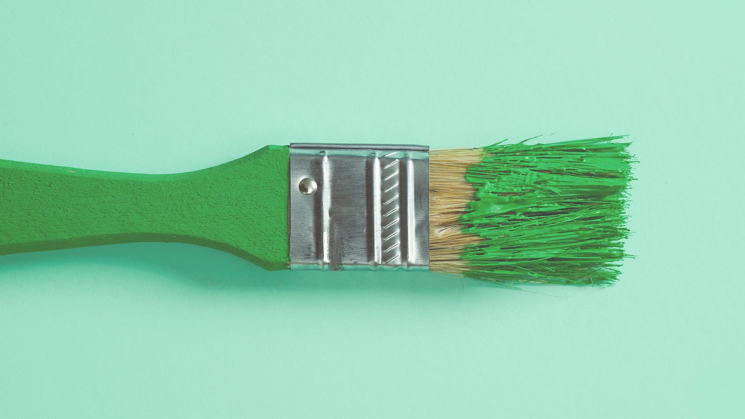 Paint brush with green paint