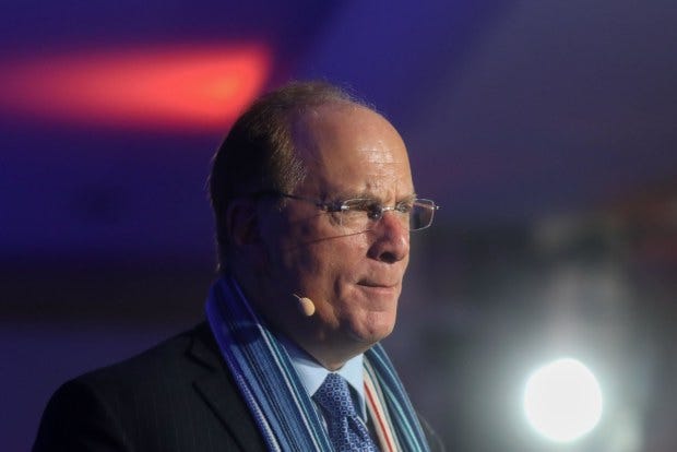 Coinbase deal gives clients of Larry Fink's BlackRock access to crypto