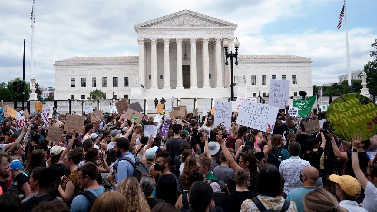 Abortion rights activists react outside the U.S. Supreme Court after the overturning of Roe Vs. Wade, in Washington, DC, on June 24, 2022.