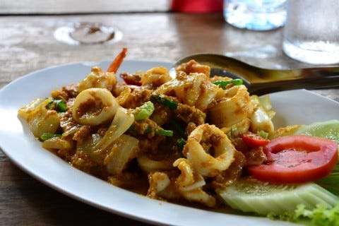 A quick bite in Sichon, southern Thailand. 
