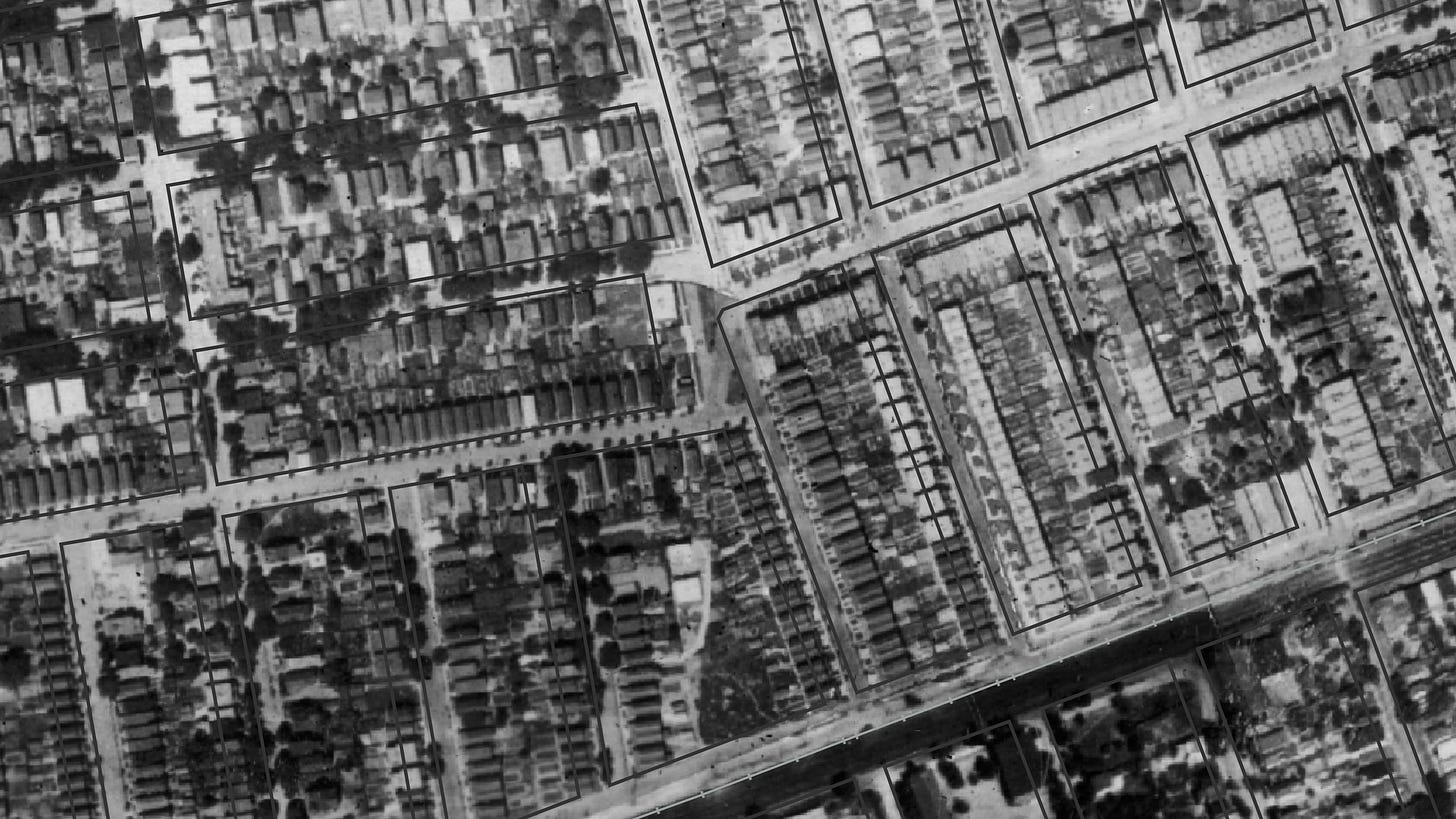 Image is an aerial photograph from 1924 of the location that would become known as Whiting Square.