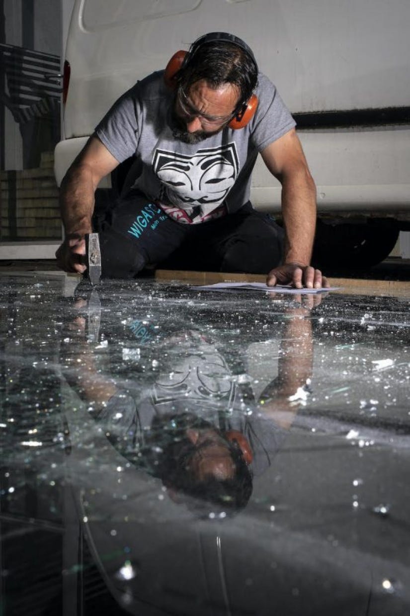 Artist Simon Berger breaks glass to create harmony and beauty out of chaos
