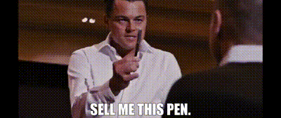 Jordan Belfort from Wolf of Wall Street asks a workshop attendee to, "sell me this pen".