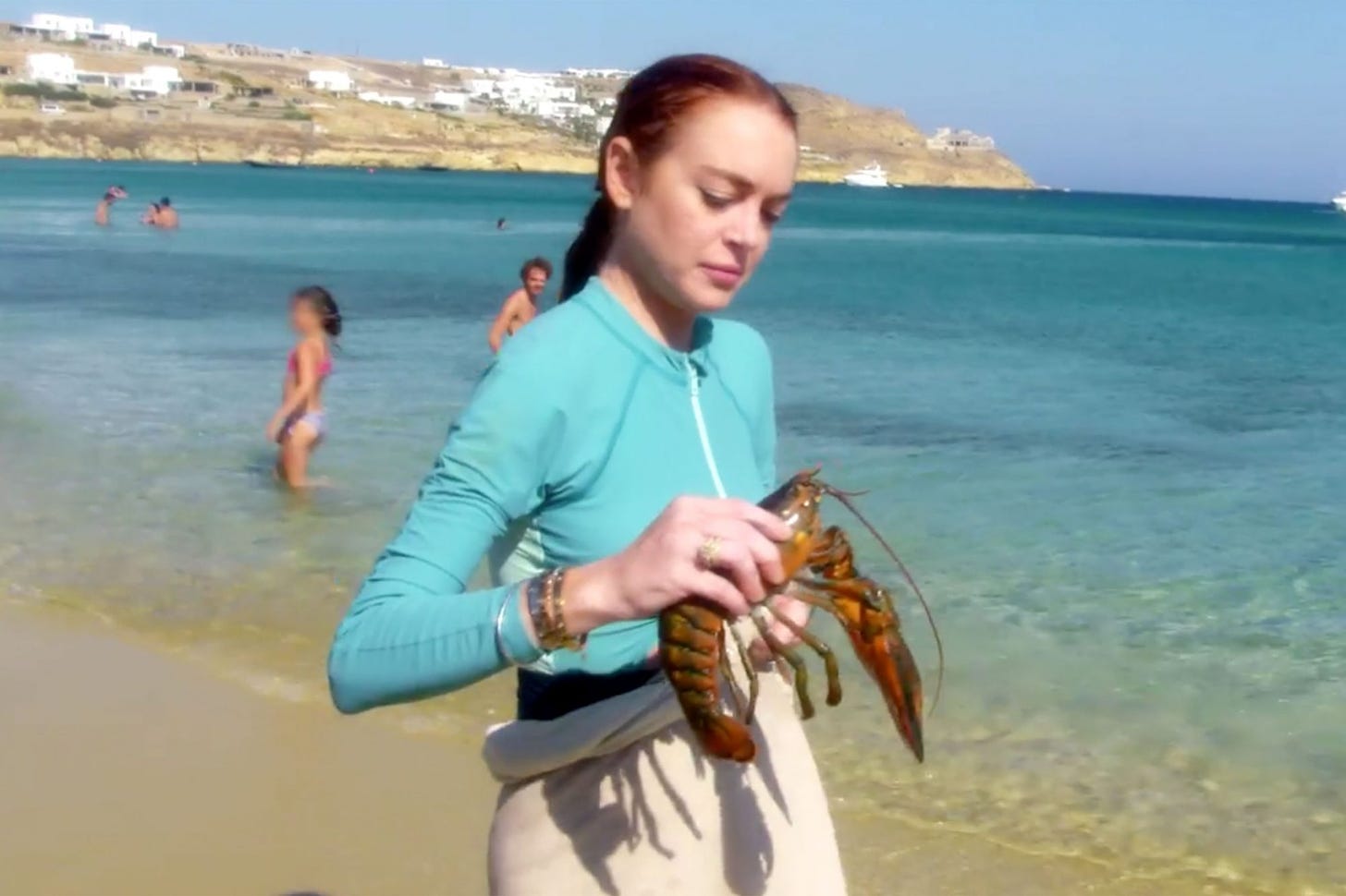 Lindsay Lohan saves lobster in Beach Club clip | EW.com
