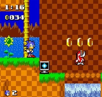 A screenshot of Sonic standing and looking at the camera, waiting for the player to once again move him. Elapsed time, and number of rings and lives are displayed, and the scene also features a familiar enemy, the robot fish from Sonic 2.