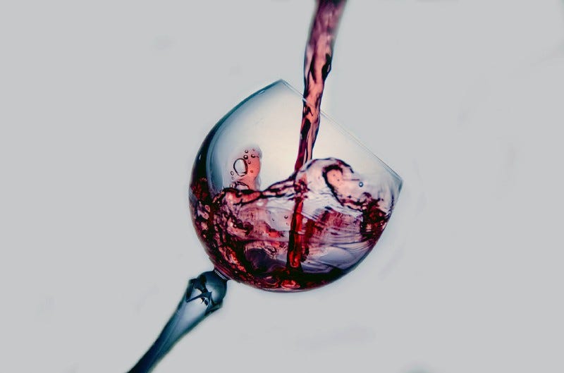 Picture of wine being poured into a glass