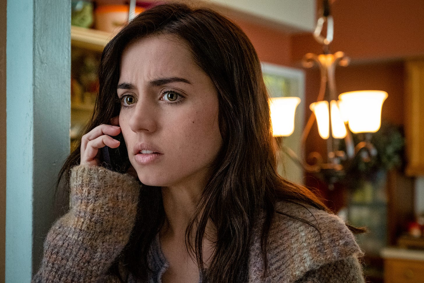 Ana de Armas as Marta Cabrera on the phone in KNIVES OUT.
