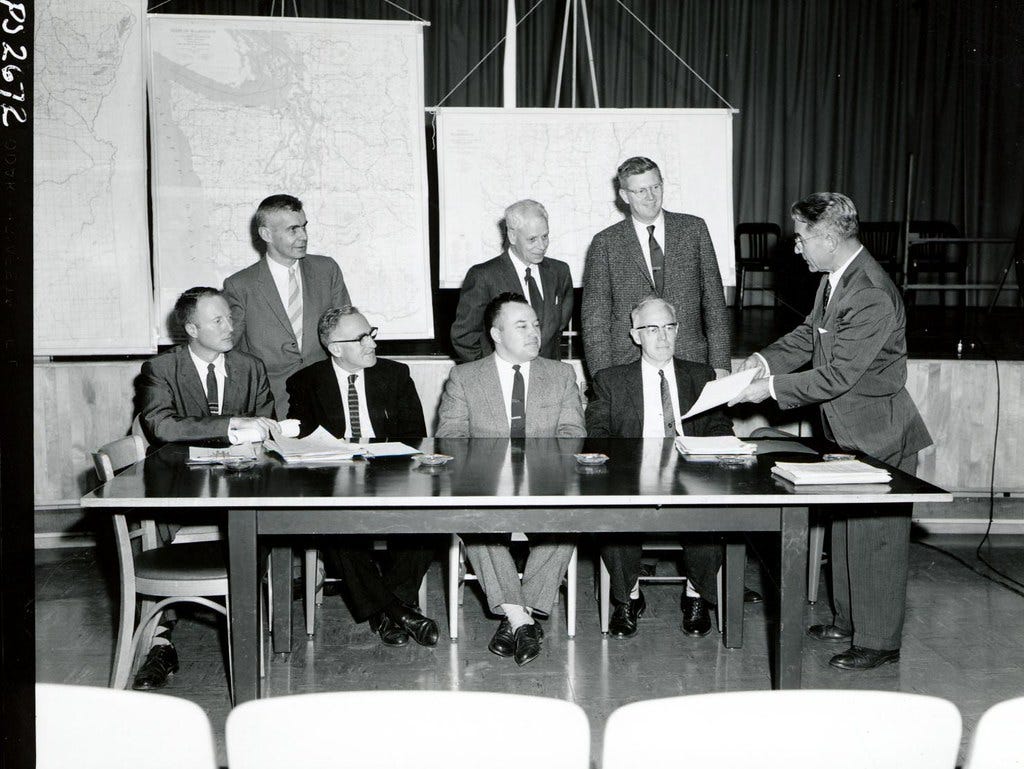 1959. Northwest Forest Pest Action Council executive committee. L-R: Glascock, Furniss, Howard, Cornelius, Barnes, Bjorklund, Taylor, Kolbe. Portland, Oregon.