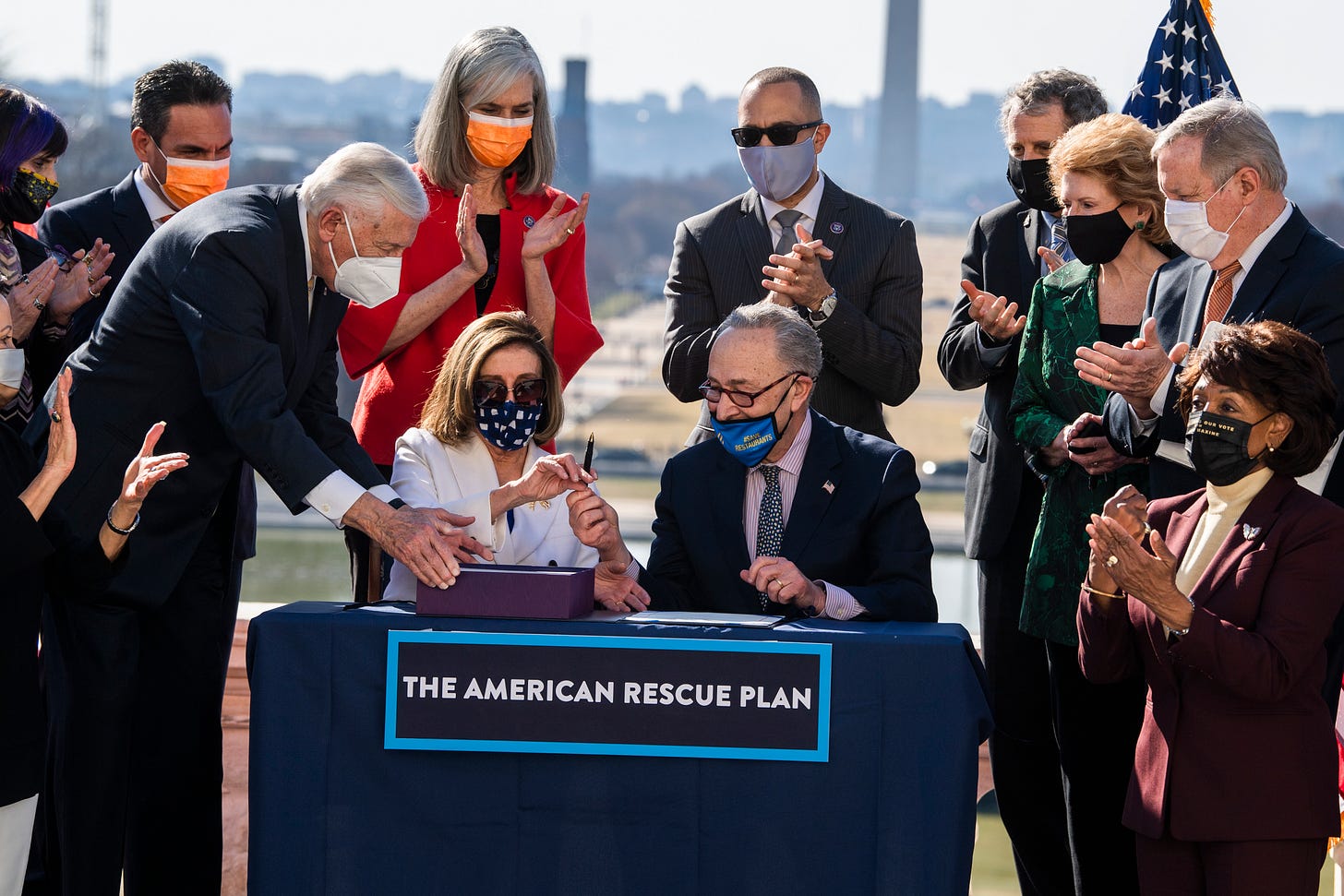 From left, House Majority Leader Steny Hoyer, D-Md., Speaker of the House Nancy Pelosi, D-Calif., and Senate Majority Leader Chuck Schumer, D-N.Y., sign the American Rescue Plan Act at a bill enrollment ceremony on the West Front of the Capitol after the House passed the $1.9 trillion covid-19 relief package, on Wednesday, March 10, 2021. (Photo By Tom Williams/CQ-Roll Call, Inc via Getty Images) From left, House Majority Leader Steny Hoyer, D-Md., Speaker of the House Nancy Pelosi, D-Calif., and Senate Majority Leader Chuck Schumer, D-N.Y., sign the American Rescue Plan Act at a bill enrollment ceremony on the West Front of the Capitol after the House passed the $1.9 trillion covid-19 relief package, on Wednesday, March 10, 2021. (Photo By Tom Williams/CQ-Roll Call, Inc via Getty Images)