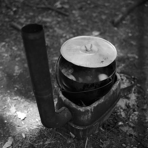 Free Close-up of a Small Iron Cauldron for Outdoor Cooking  Stock Photo