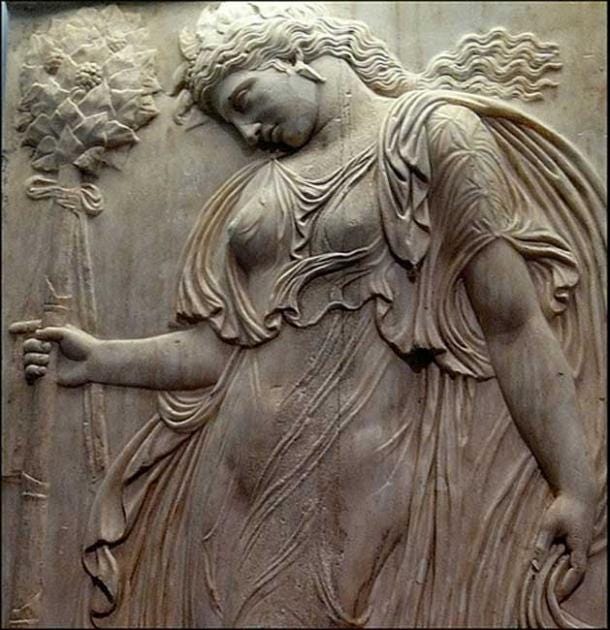 A Roman relief showing a dancing maenad holding a thyrsus (12-140 AD). 