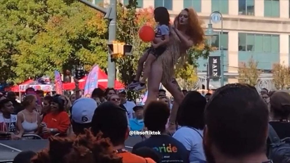 Nearly Naked Man in Drag Picks Up Child and Dances With Him on Stage at Pride Event in Columbia, SC