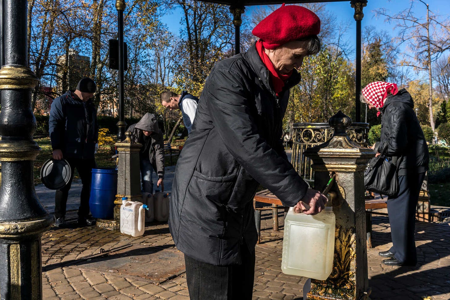 Collecting drinking water from public taps in Shevchenko Park on Monday in Kyiv.